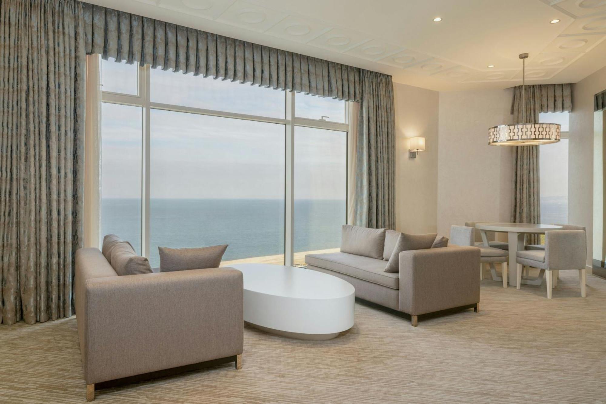 Sheraton Batumi Hotel Extérieur photo A living room in a typical apartment